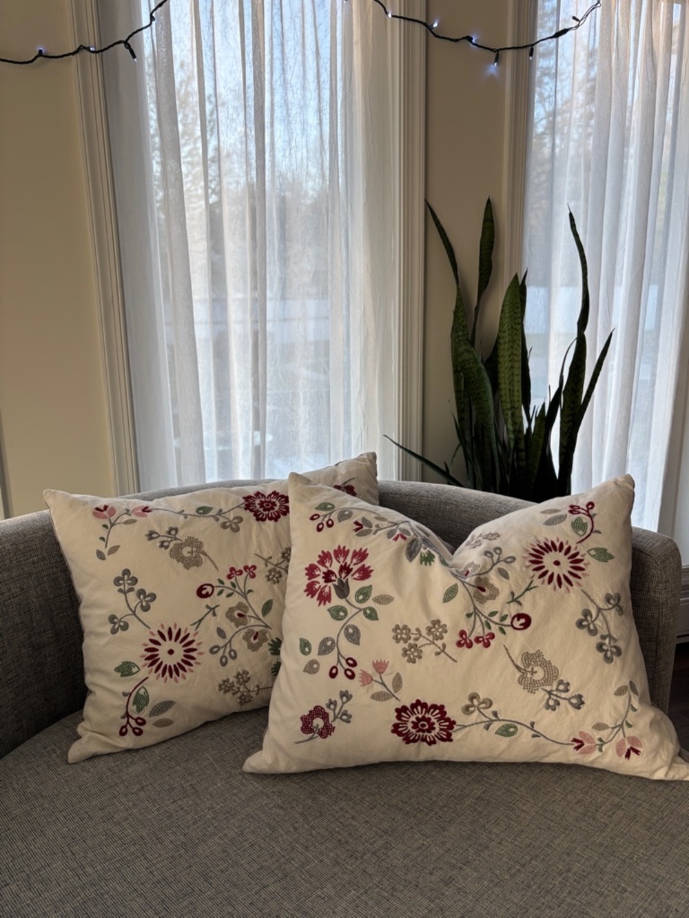 IKEA Throw Pillows with Red and Green Floral Embroidery